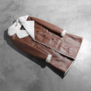
Open Hem & Hem Craftsmanship Construction Detail on Amie Brown Double Breasted Shearling Coat