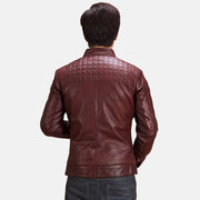 Close-Up Detail of Band with Snap Button &amp; Zipper Hardware on Burgunn Dee Maroon Leather Biker Jacket