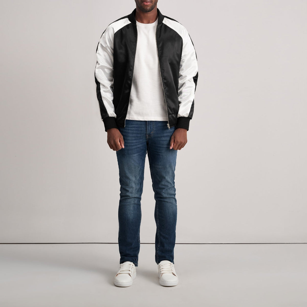 Close-Up Detail of Varsity &amp; Zipper Hardware on Clarke Black Varsity Jacket