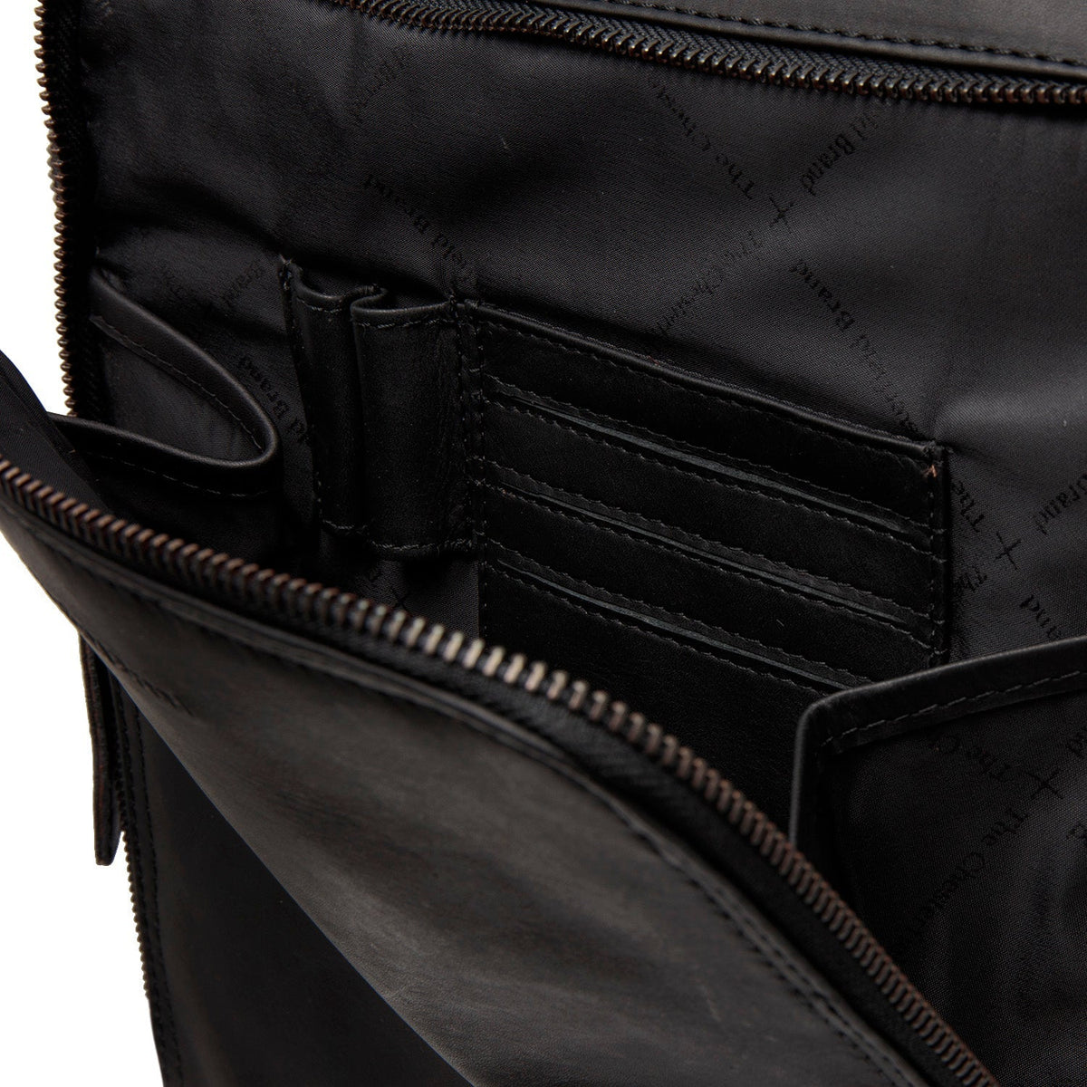 Solid Antique Brass Hardware &amp; Heavy-Duty Dual Zipper Detail on Jasper Full-Grain Leather Laptop Backpack