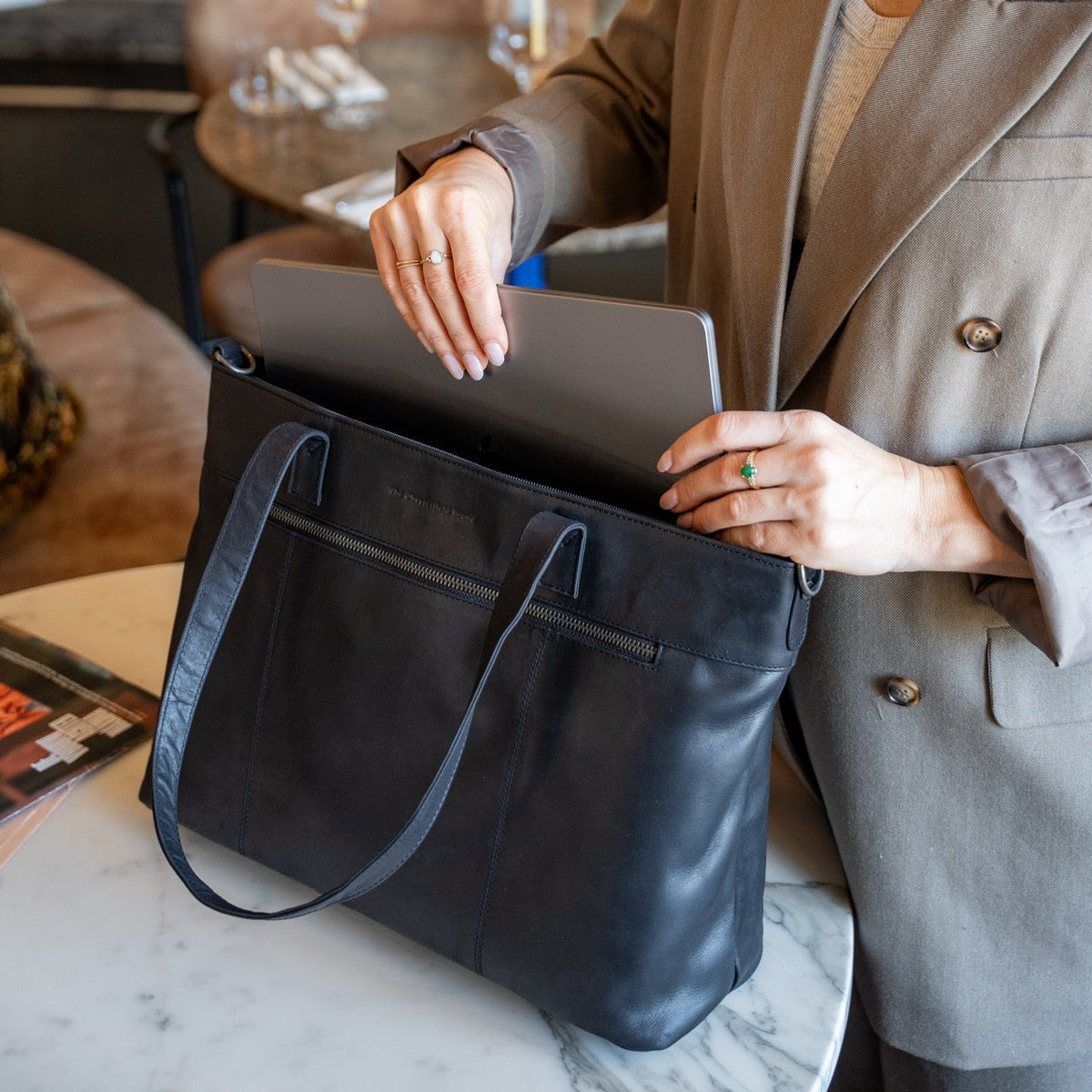 Solid Antique Brass Hardware & Heavy-Duty Dual Zipper Detail on Osira Full-Grain Leather Tote Bag