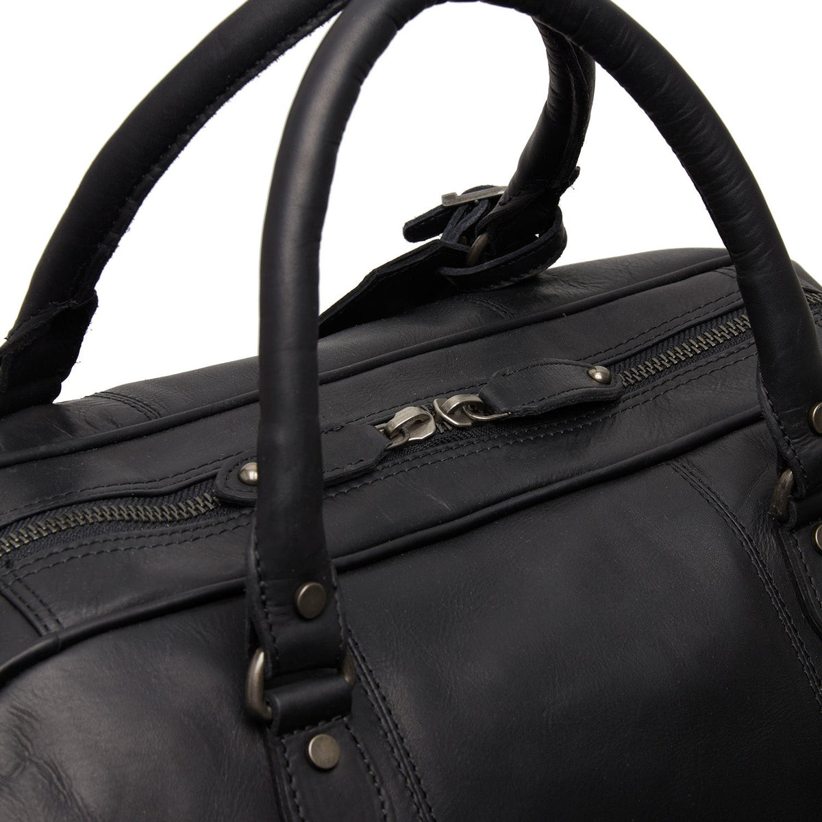 
100% Full-Grain Wax Pull-Up 100% Full-Grain Leather Grain Texture & Handcrafted Patina Detail