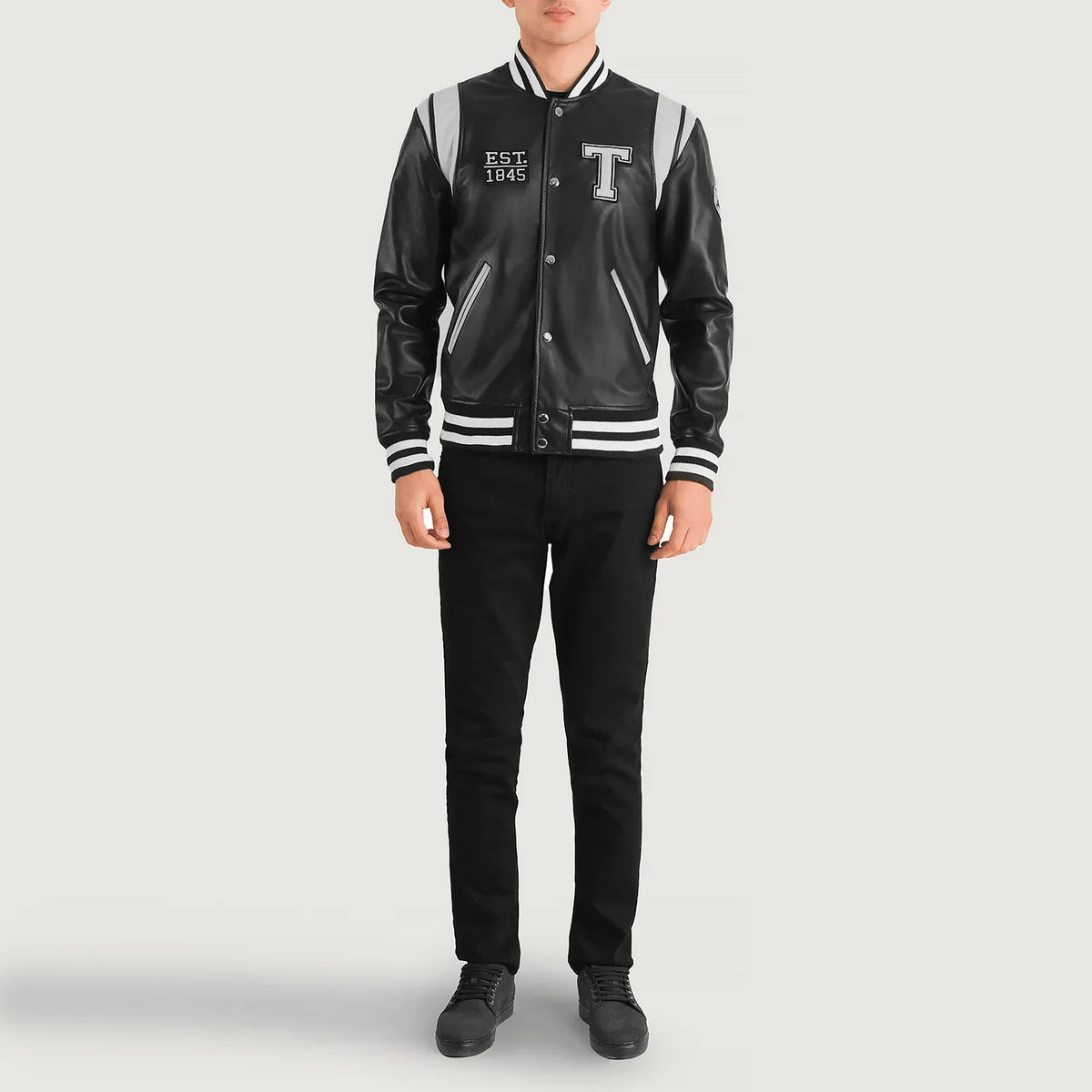 
Liberte Texas Черный Leather Varsity Кожаная куртка для Мужчин - Вид сбоку, демонстрирующий эргономичный крой рукава