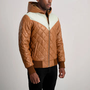 
Как выглядит на человеке:  Norman Tan Hooded Bomber Leather Puffer Jacket на модели — естественные складки при дневном свете