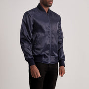 
Blue Satin Bomber Jacket - Вид сзади, подчеркивающий посадку по плечам и ровный край